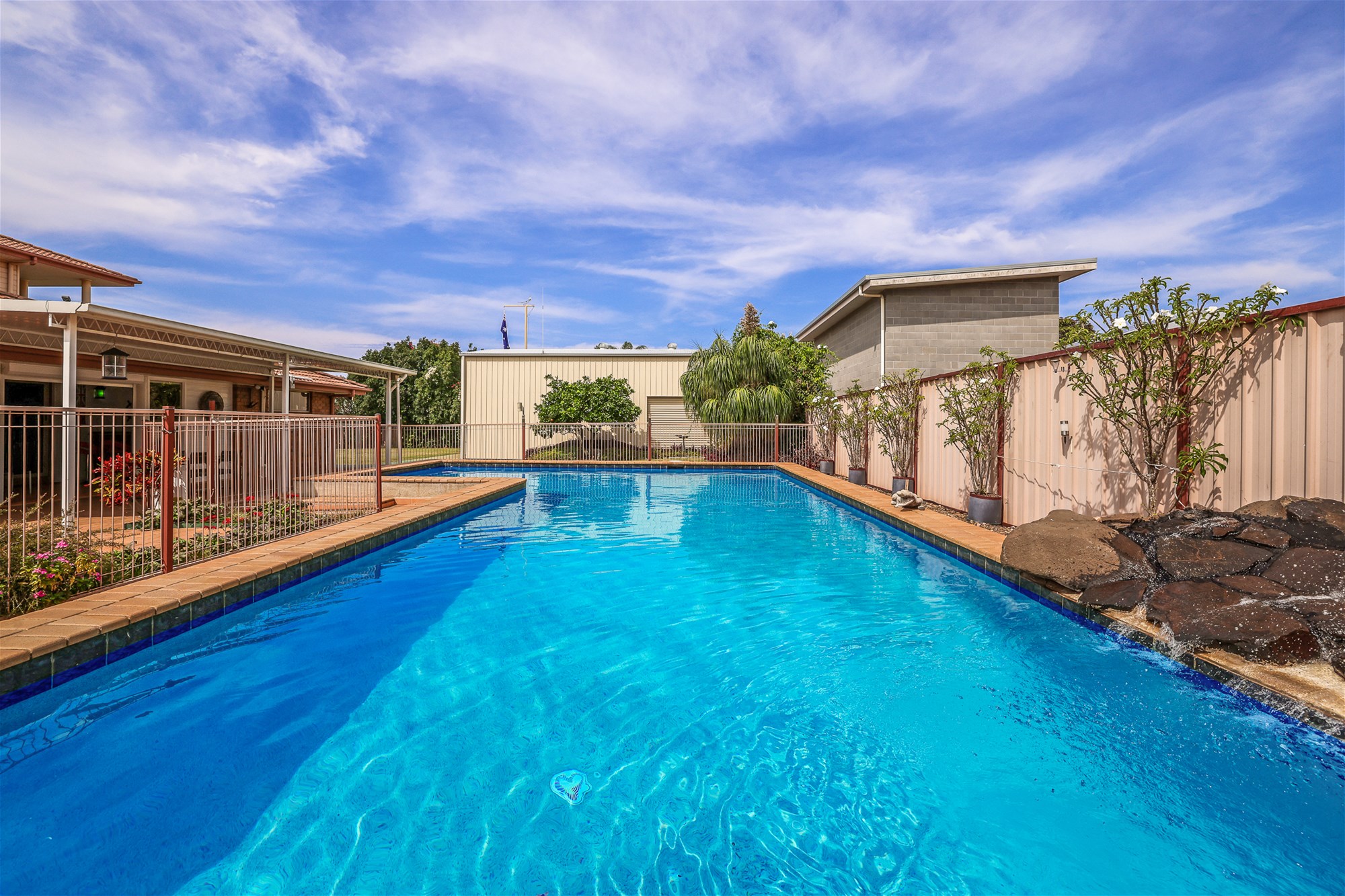 PHENOMENAL FAMILY RESIDENCE ON DOUBLE BLOCK WITH RESORT STYLE POOL & HIGH CLEARANCE SHED