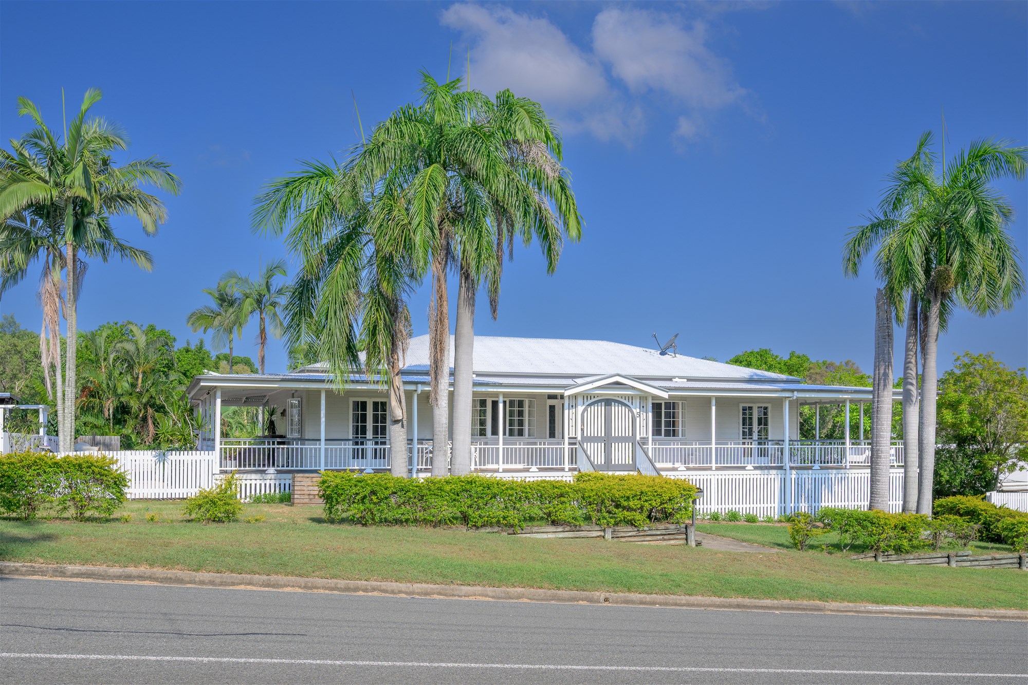 Classic Queenslander Charm with Wrap Around Veranda & Powered Shed!