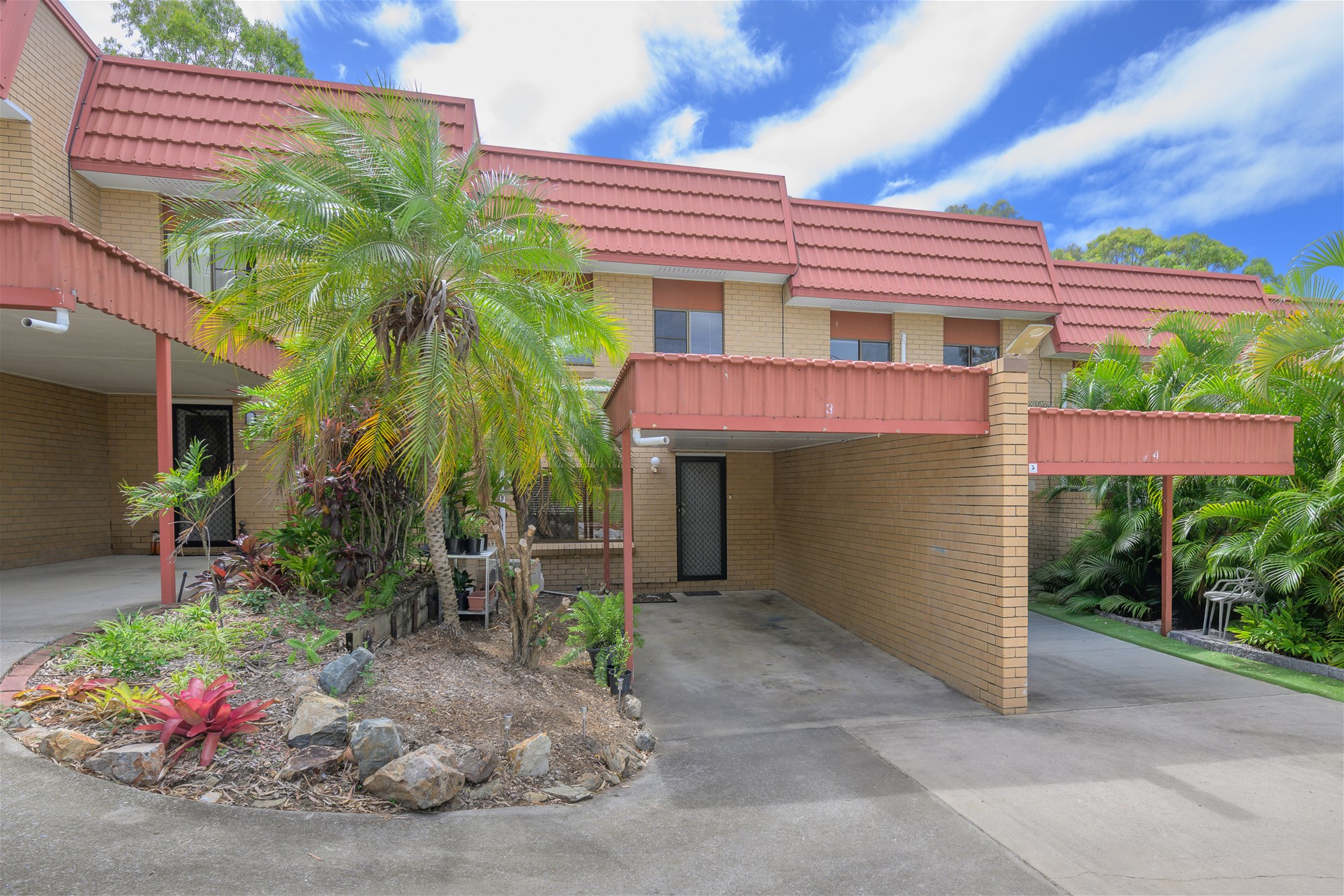 Low Maintenance Townhouse Living with Private Courtyard in Convenient Location