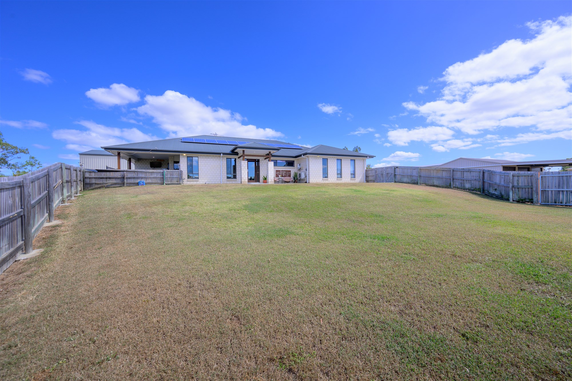 Spacious Family Living in Prestigious Country Club Estate on 4,239m² with Shed, Solar & Exceptional Entertaining