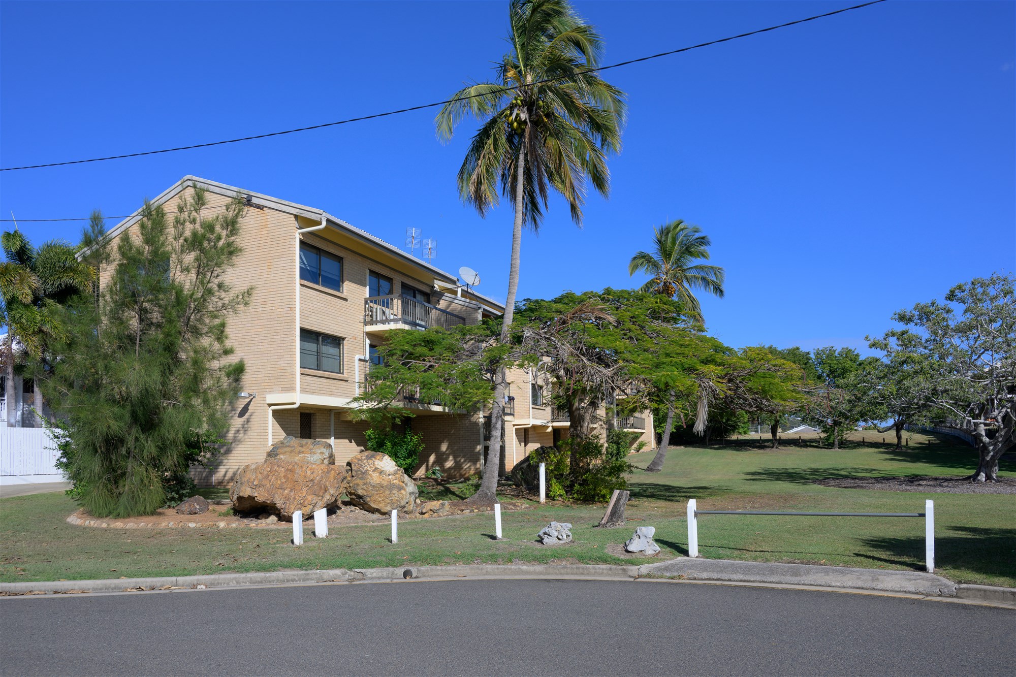 Elevated Living with Coastal Breezes and Convenient Location